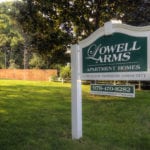 Lowell Arms Signage | Apartments in Methuen